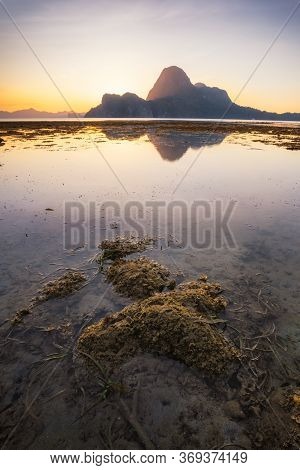 El Nido Adventure, Beautiful Cadlao Island At Sunset At Low Tide With Surface Reflection. Palawan Is