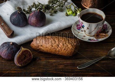 Light Coffee Break With Multicereal Bun And Few Juicy Ripe Figs.