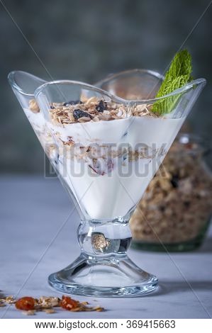 Homemade Granola With Raisins, Dried Apricots And Nuts.
Granola With Raisins, Dried Apricots, Nuts, 
