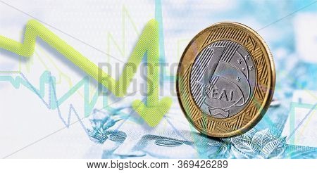 Conceptual Image Brazilian Economic Crisis, Details Of 100 Reais Banknotes In Brazil And One Real Cu