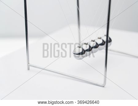 Pendulum On A White Background
