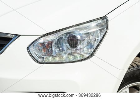 Novosibirsk/ Russia - May 03, 2020: Nissan Terrano, Glowing Headlight Of A Modern Car Close-up