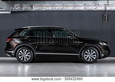Novosibirsk/ Russia - March 15, 2020: Black  Volkswagen Touareg, Side View.  New Expensive Crossover