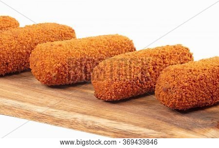 Brown Crusty Dutch Kroketten On A Serving Tray, Selective Focus, Isolated