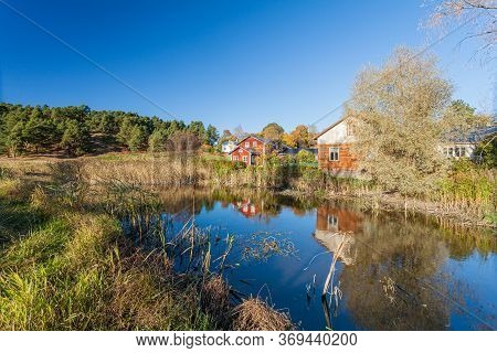 Porvoo, Finland, October 08, 2016: Water Canal And Colored Houses In Old Town Porvoo.