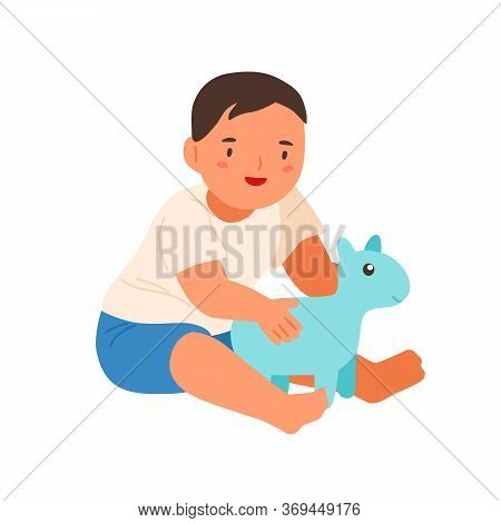 Cute Smiling Child Playing With Soft Toy Vector Flat Illustration. Happy Little Boy Sitting Hugging 