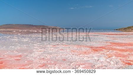 Brine And Salt Of A Pink Lake Koyash Colored By Microalgae Dunaliella Salina, Famous For Its Antioxi