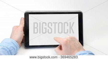 Male Hands Holding Digital Tablet Blank Screen On White Background. Take Your Screen To Put On Adver