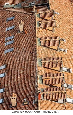 Pantiles. Closeup Of An Old House Roof With Tiles Made From Clay (coppo In Italian Language), Skylig