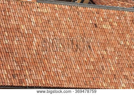Pantiles. Closeup Of An Old House Roof With Tiles Made From Clay (coppo In Italian Language), Seen F