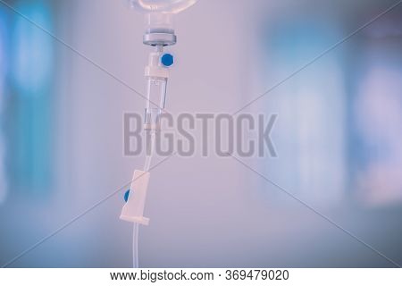 Closeup Of Iv Drip  In Hospital, Intravenous Saline Solution.