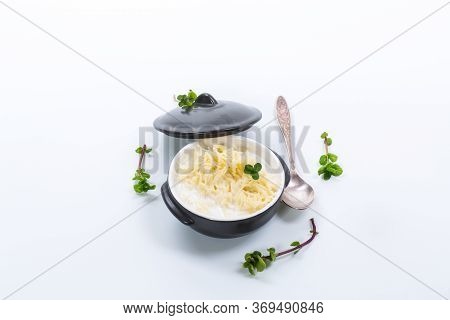 Sweet Boiled Vermicelli With Milk In A Ceramic Bowl