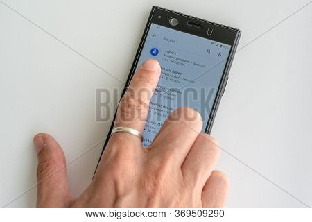 Installing Italian Immuni Tracking Application On Smartphone Against Coronavirus Pandemic.