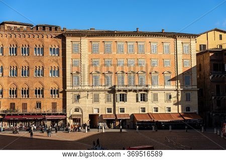 Siena, Tuscany, Italy - Jan 6, 2017: Ancient Palaces (palazzo Sansedoni And Chigi Zondadari) In Piaz