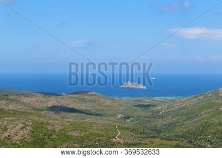 Landscape French island Giraglia with lighthouse near Corse