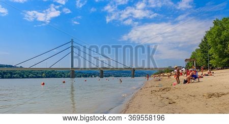 Novi Sad, Serbia - July 3, 2019: People Enjoy On A Beach (strand) On A Danube River, View At Liberty