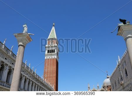 Bell Tower Of Saint Mark In Venice And Blue Sky