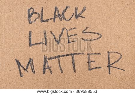 Black Lives Mablack Lives Matter Words Written On Cardboard.