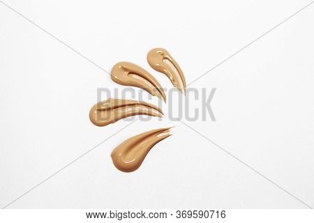 Liquid Foundation For Makeup. For Foundation Smudges On A White Background.