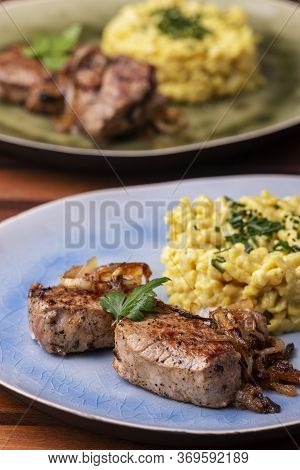 Roasted Pork Fillet And Spaetzle In A Plate