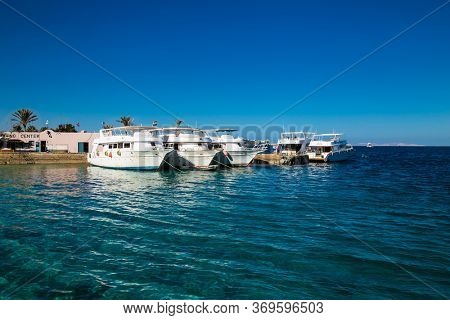 Hurgada, Egypt- Jan 26 , 2020: Snorkeling boats at dock of  the resort hotel in Hurgada, South Sinai, Egypt.