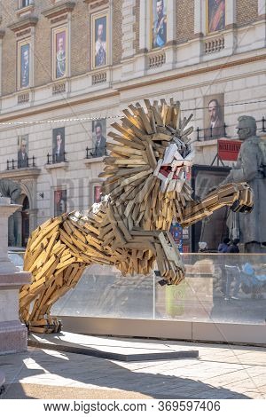 Budapest, Hungary - Feb 9, 2020: Jumping Lion Guards The Entrance To The Ybl Buda Creative House