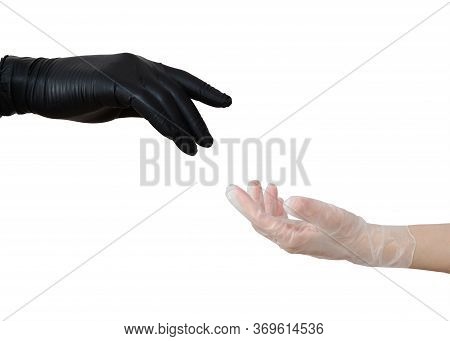 Two Hands In Sterile Gloves Stretch To Each Other.