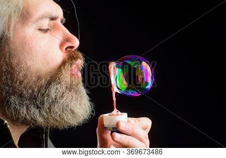 Closeup Portrait Of Man Blowing Bubbles. Soap Bubbles. Play With Bubbles. Bearded Man Blowing Soap B