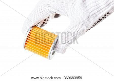 Orange Automobile Paper Filter Holds The Hand Of An Engineer In White Glove On A White Background Cl