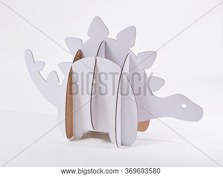 Dinosaur Stegosaurus Made Of Cardboard. Idea For The Birthday Party, Dino Party Or Photo Session