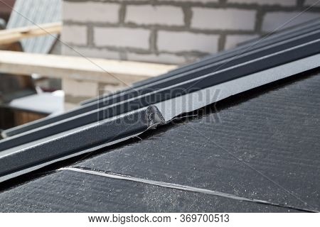 Close Up View Of The Seam Roof Under Construction On The Waterproofing Layer