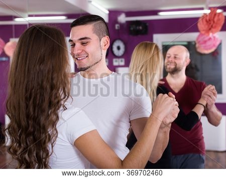 Happy Young People Having Dancing Class Together Indoors