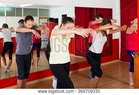 Happy Yound Couples Dancing Contemp In Studio Smiling And Having Fun