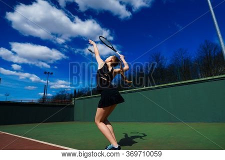 Happy Beautiful Sexy Girl Playing Tennis On The Court. Sport And Recreation, Leisure