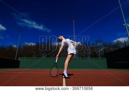 Happy Beautiful Sexy Girl Playing Tennis On The Court. Sport And Recreation, Leisure