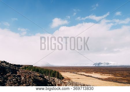 View From The Silfra Fault, In The Tingvedlir Valley In Iceland, To The Vast Expanses Of Fields With