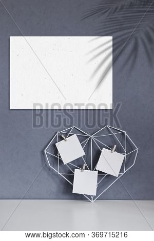 Graceful Openwork Heart With Notes On A Concrete Wall Background. Minimalism. Concept Symbol Of Love