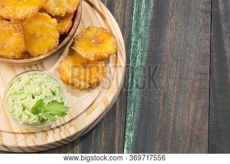 The Patacón, Tostón, Tachino, Fried Or Chopped Is A Meal Based On Flattened Fried Pieces Of Green Pl