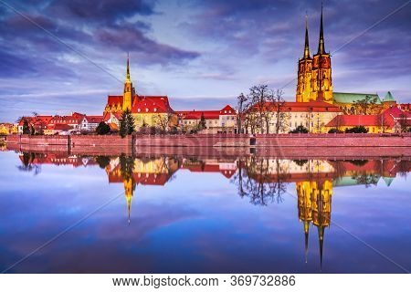 Wroclaw, Poland. Historical Cathedral Island In The Wroclaw Old Town With Oder River Water Reflectio
