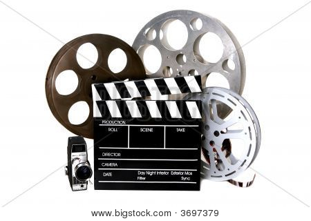 Film Reels And Directors Clapper With Vintage Camera