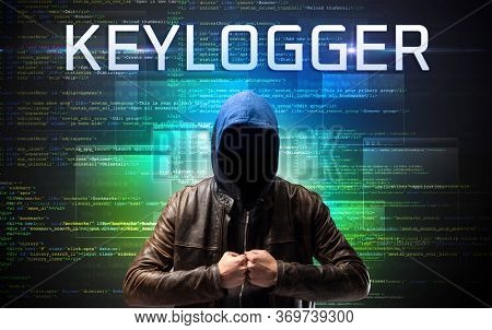 Faceless hacker with KEYLOGGER inscription on a binary code background