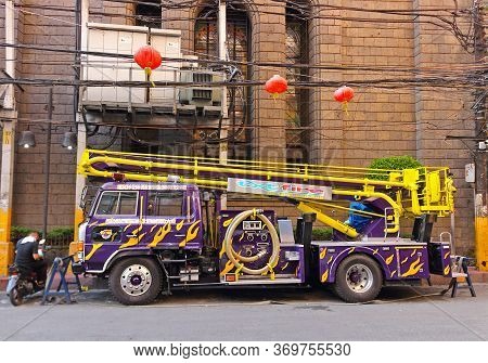 Manila, Philippines - September 24, 2018: Purple Fire Truck With Stairs In Binondo District, Manila,