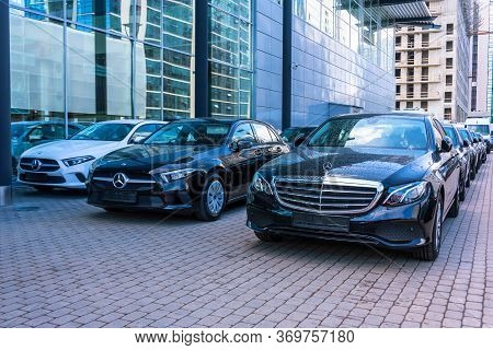 Black Mercedes-benz Three Cars In A Row Store Mercedes, Front View. Russia, Saint-petersburg. 13 May