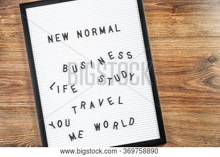 New Normal Text On White Letter Board Background. Adapting To New Life Or Business Post-lockdown Cha