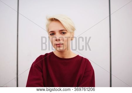 Caucasian Millennial Female Posing On Copy Space Background