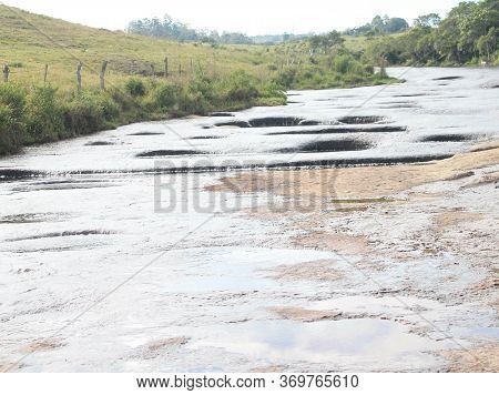 Rio Las Gachas With Its Peculiarity Of Passing Over This Great Rock And Drilling Huge Holes Through 