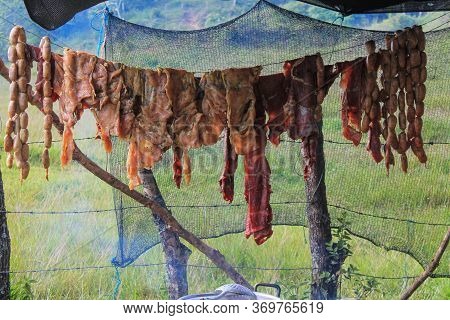 Meat Exposed To The Sun To Carry Out A Traditional Cooking Process In The Colombian Countryside, Las