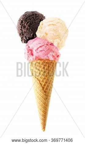 Triple Scoop Ice Cream Cone Isolated On A White Background. Chocolate, Vanilla And Strawberry Flavor
