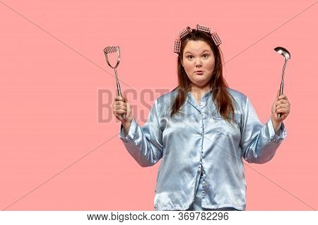 A Plus Size Model Girl With A Surprised Face Looks Into The Camera. On The Gogol Buguri.