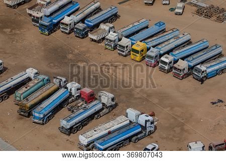 A Group Of Trucks Parked In A Field, Jeddah, Saudi Arabia, 2020